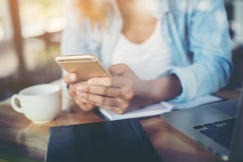 woman on her connected device